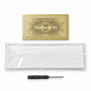 Incendio wand accessories: a gold Platform 9¾ ticket, white flash paper in a clear packet and a small black-handled screwdriver.