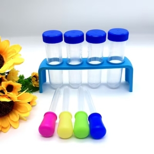 Children’s science test tube set with blue rack, four lidded test tubes and colourful silicone droppers on a white background